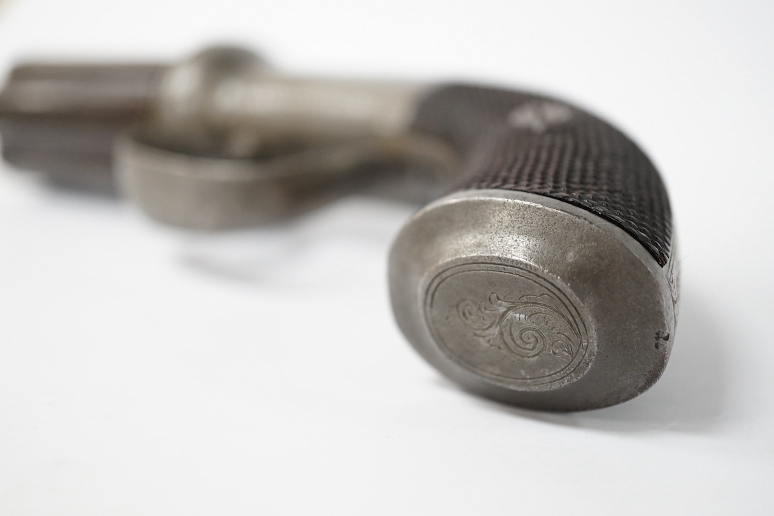 A six shot 120 bore self cocking percussion pepper box revolver, with fluted barrels, Birmingham proofed, round scroll engraved frame, and two-piece chequered walnut grips. Condition - fair to good, acid cleaned